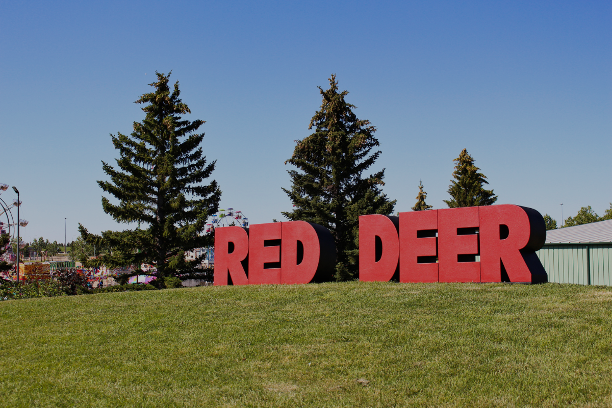 Large red sign that reads Red Deer